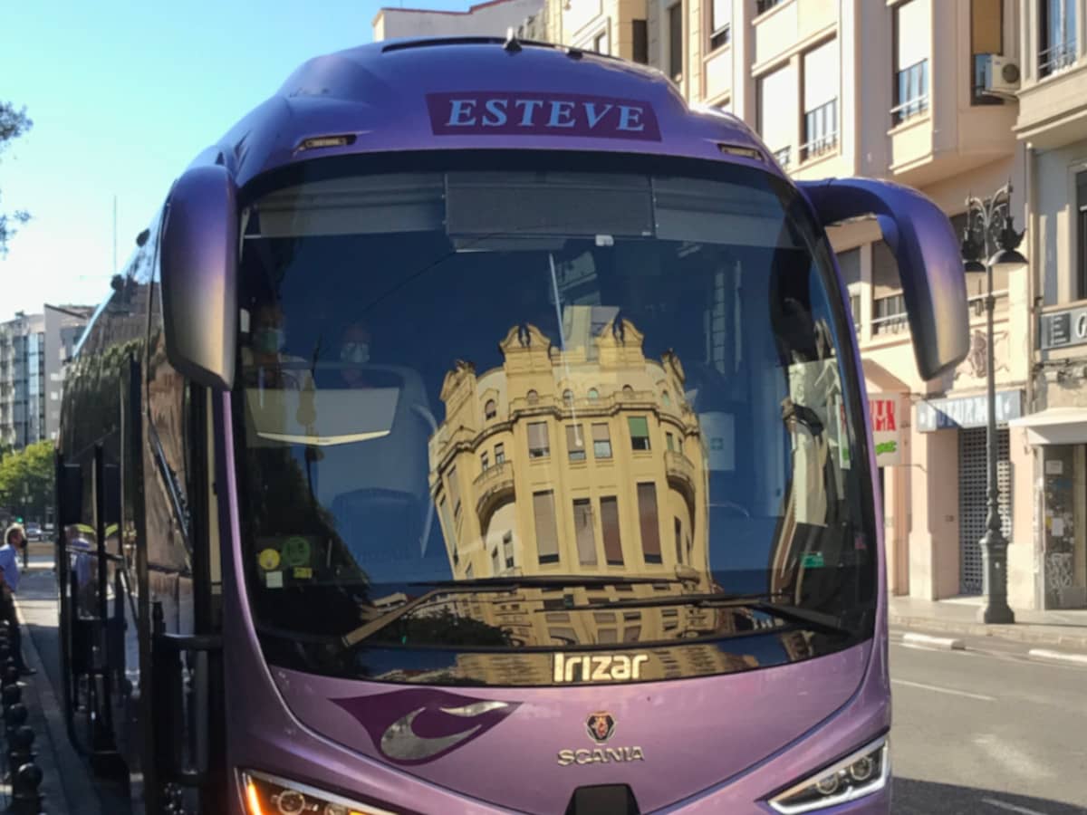 Reflection of a building on the front windshield of a bus in central Valencia, Spain.