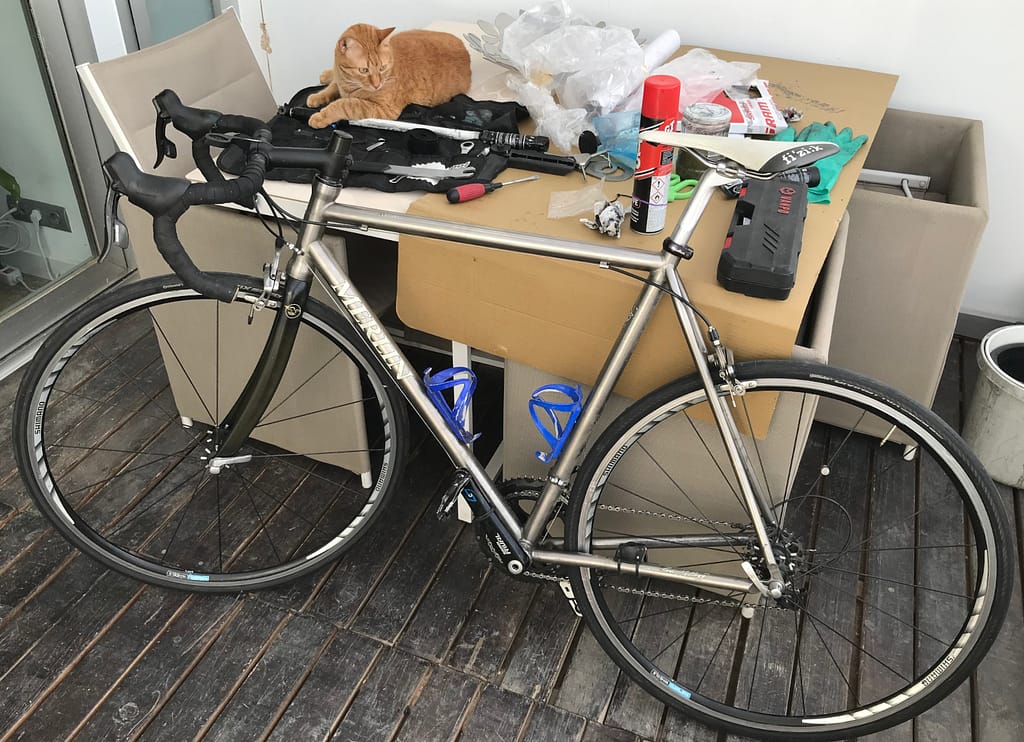 Pictures of bicycle box inspection notes and pre-and post-assembly