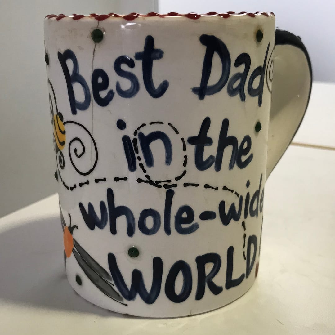 Coffee mug with the words "Best Dad in the whole-wide World."