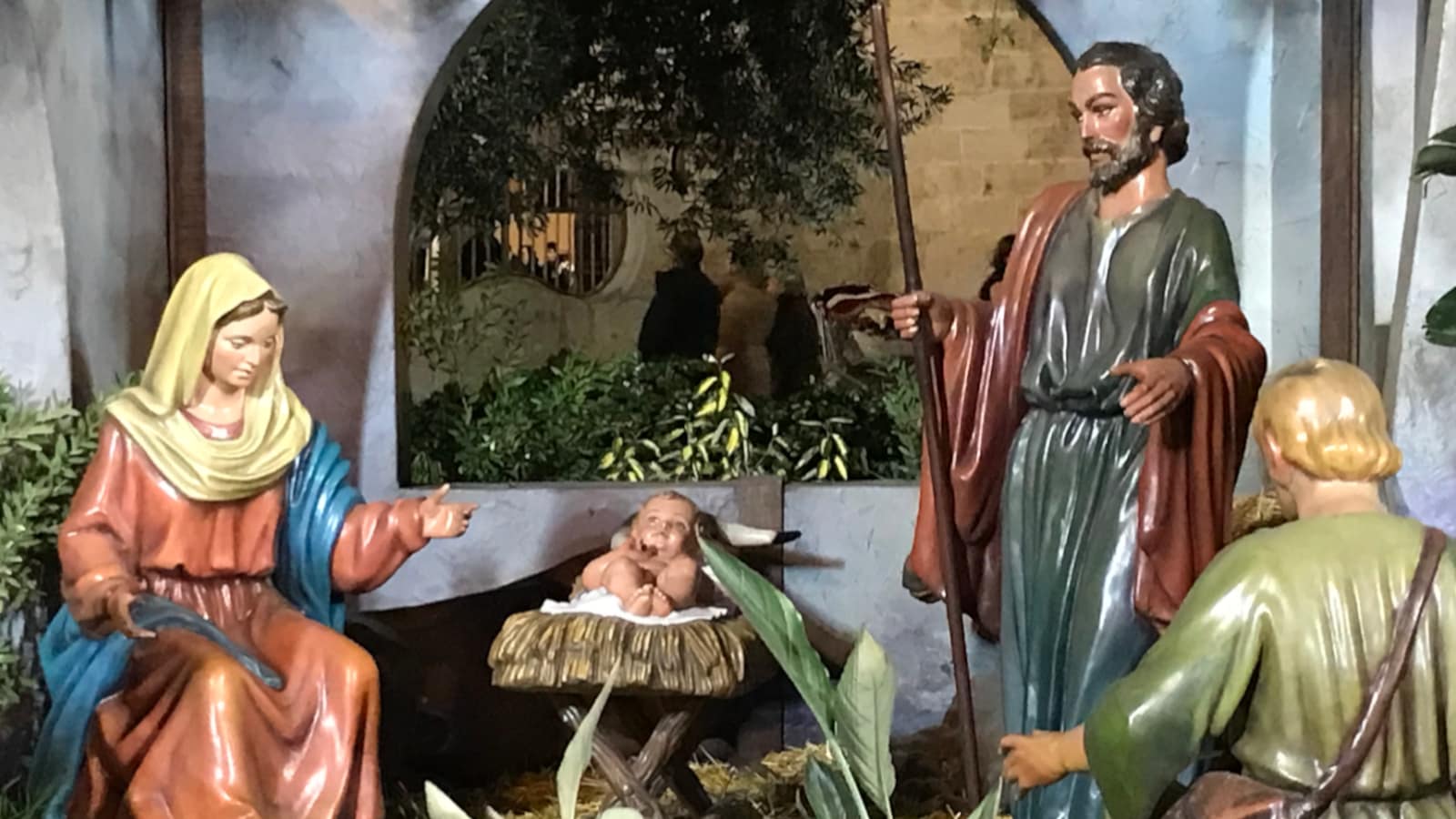 A Nativity scene showing Mary, the Christ child Jesus, and Joseph.