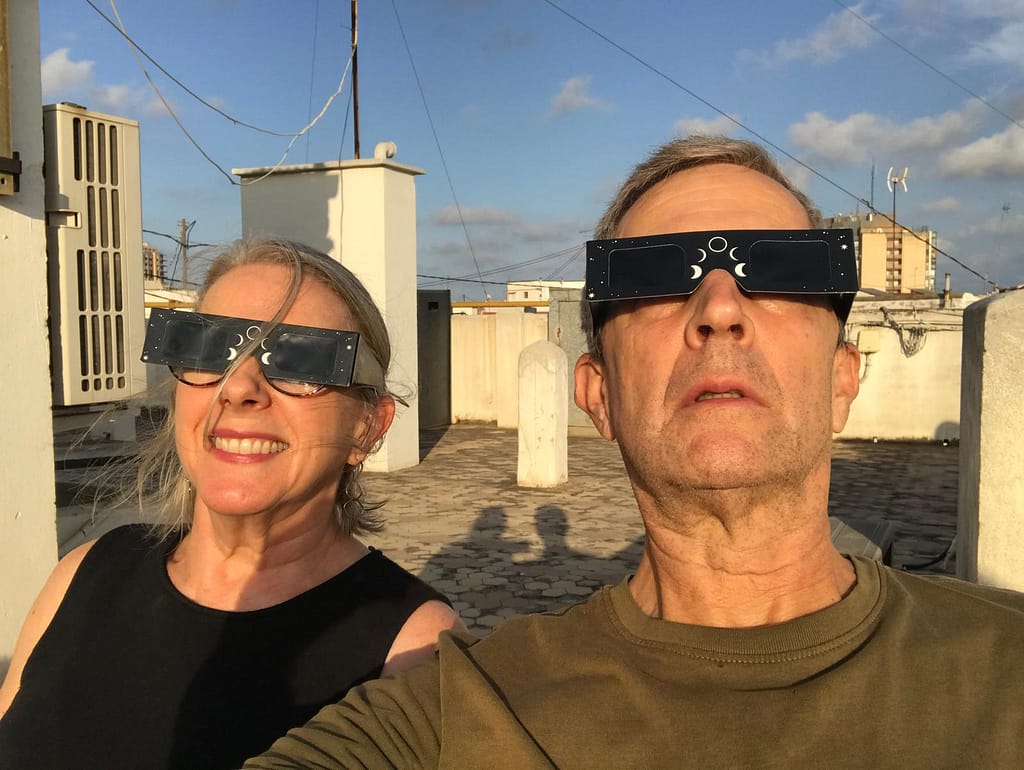 Gallery of eclipse and people watching it.