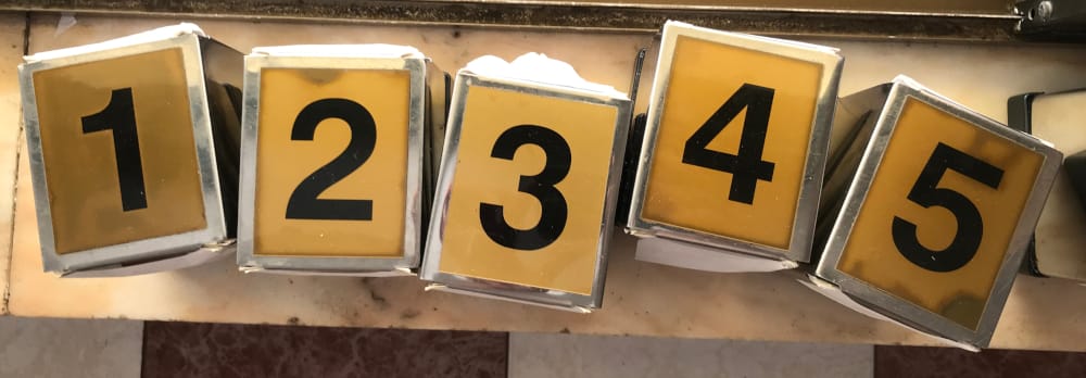 Overview of napkin containers numbered 1, 2, 3, 4, 5.